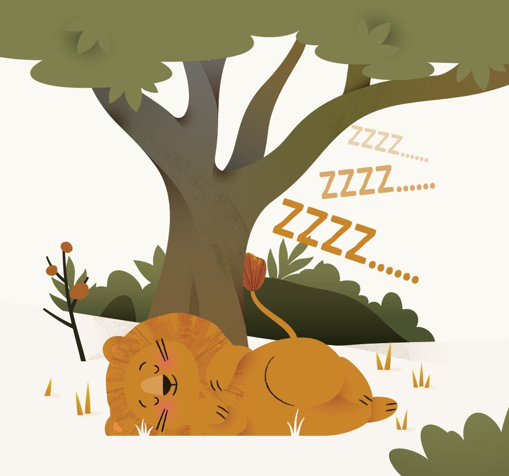 A lion asleep under the tree